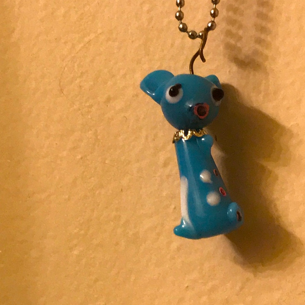 Early 90s glass pet figure on chain